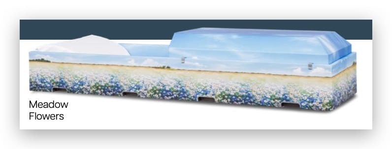 Pastel blue casket decorated with meadow flowers